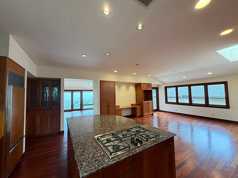 Open pass through to Living room and door too deck.