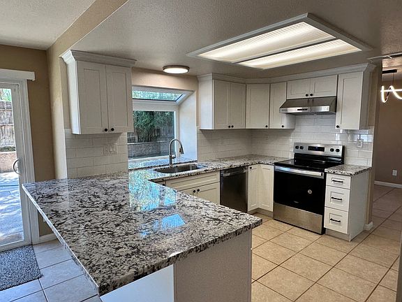 Completely new kitchen - cabinets, counter tops, appliances.