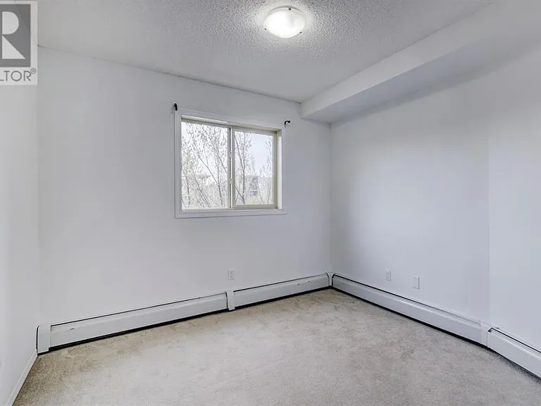 403 Mackenzie Way SW #7210 — Photo 19