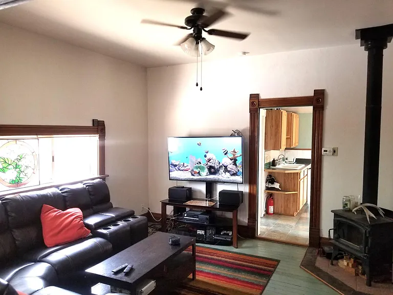 living room w former tenant's furniture