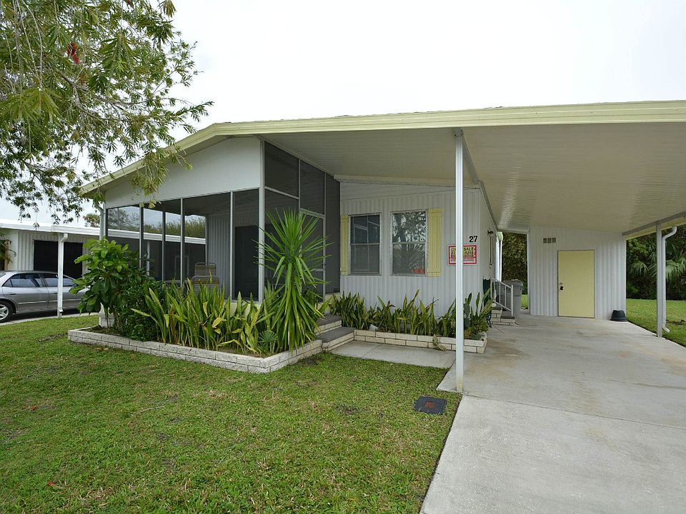 LOT 27 IN THE WOODLANDS SECTION