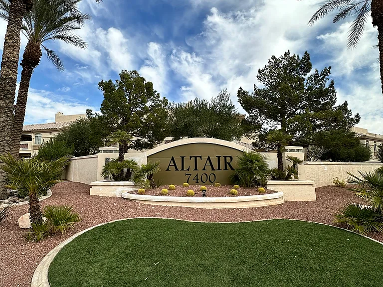 Condo is in the Altair gated community.