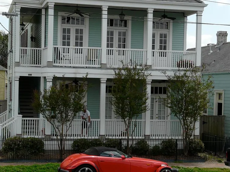 front view of house. It faces River & levy. Non metered street parking.