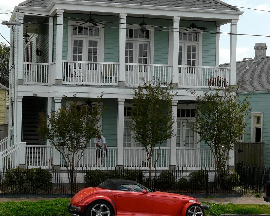 front view of house. It faces River & levy. Non metered street parking.