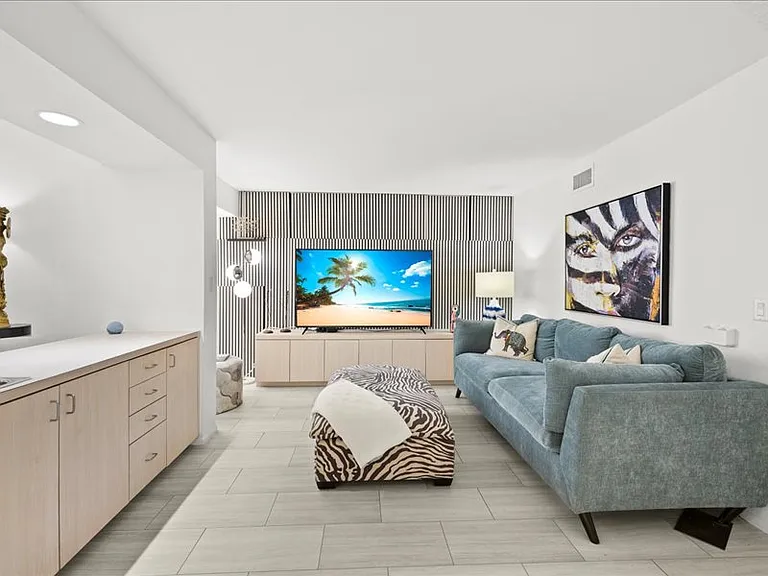 Den and wet bar.