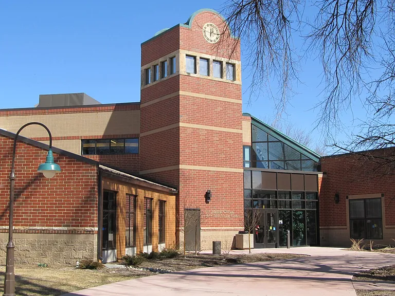 One block to Chilson Rec Center and Library