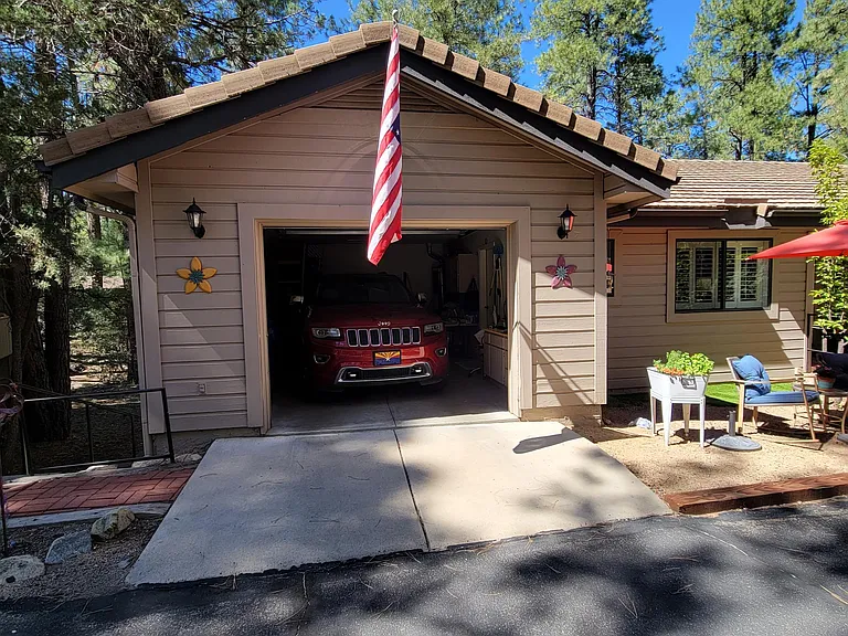 Single car garage where any vehicle must be parked except for short term loading and unloading