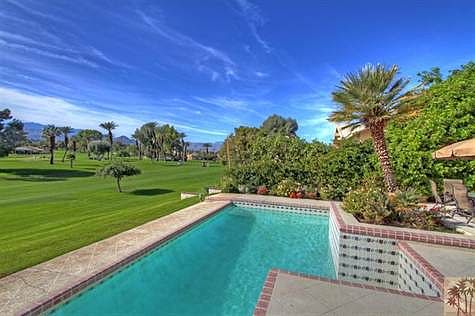 Elevated lot with wonderview views from sparkling pool.
