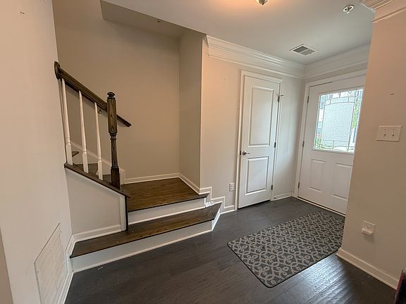 Main Front Entry and Stairs to Mid level