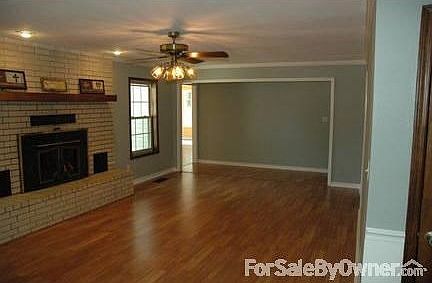 Living room 25'x14'
						:
						New ceilings, has a fireplace with insert connected to the central duct work