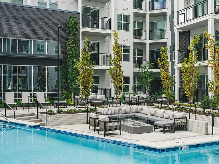 Experience paradise every day with Modera Germantown's lavish pool deck, complete with a captivating outdoor fire pit.