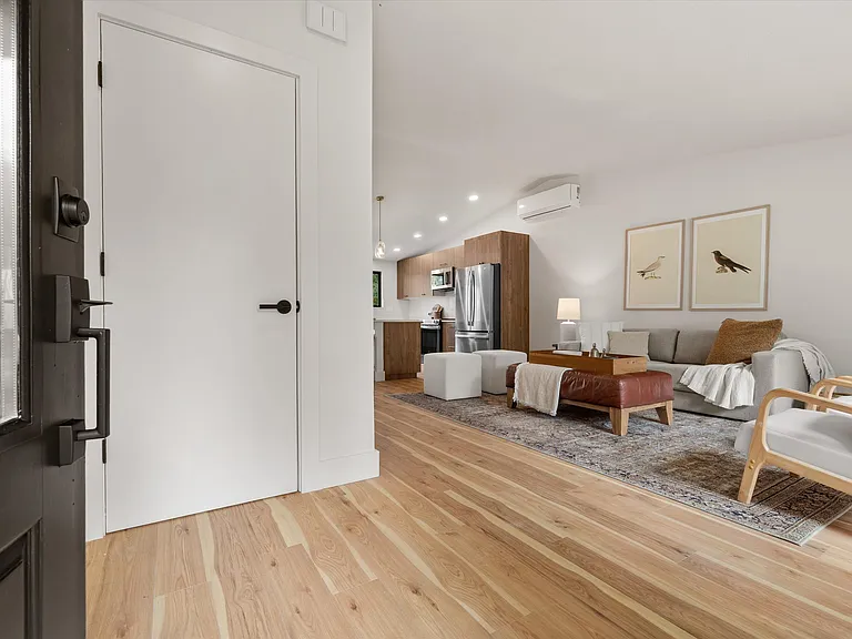 Living room/entry. Staged, rental is unfurnished