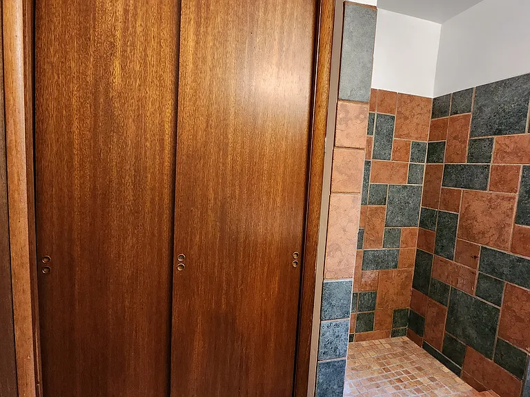 So much storage and cabinetry in this bathroom.