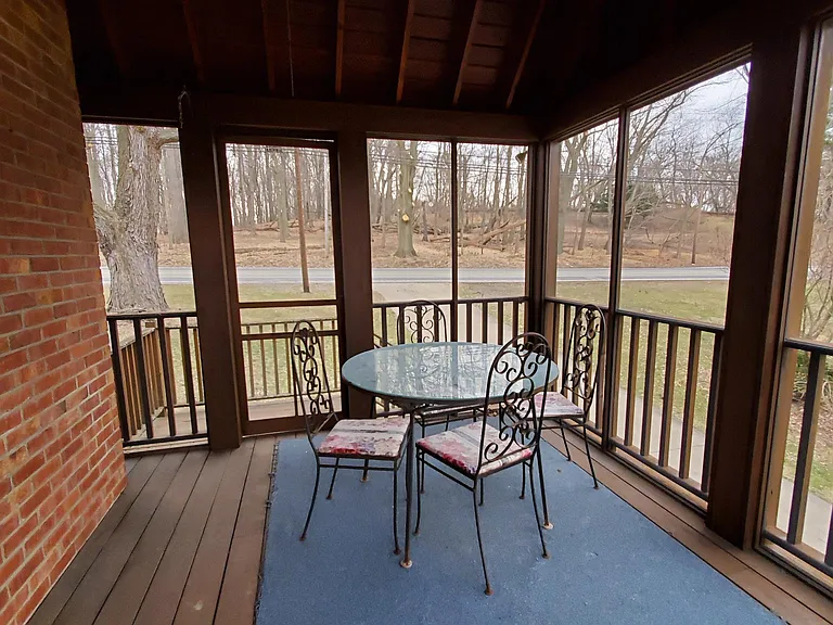 Screened cedar covered deck