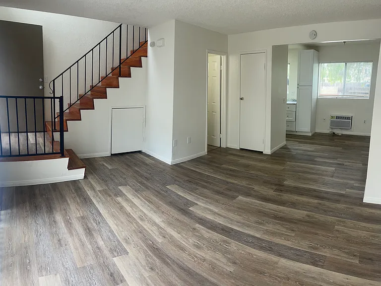 Downstairs is living area, dining, kitchen and 1/2 bath