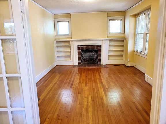 the Living Room. A fireplace is now decorative