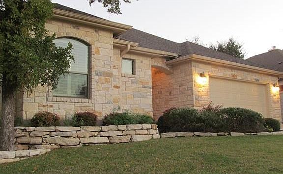 This home has Texas Limestone on all 4 sides with special landscaping.