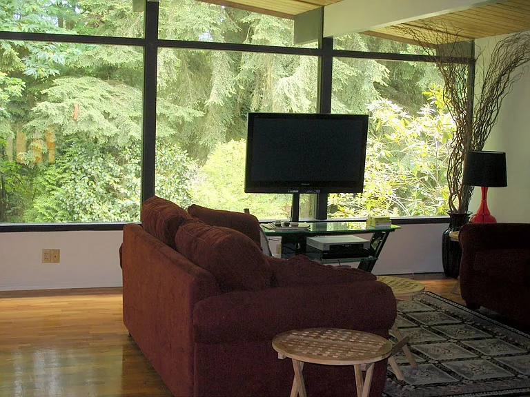 Living room has gas fireplace
