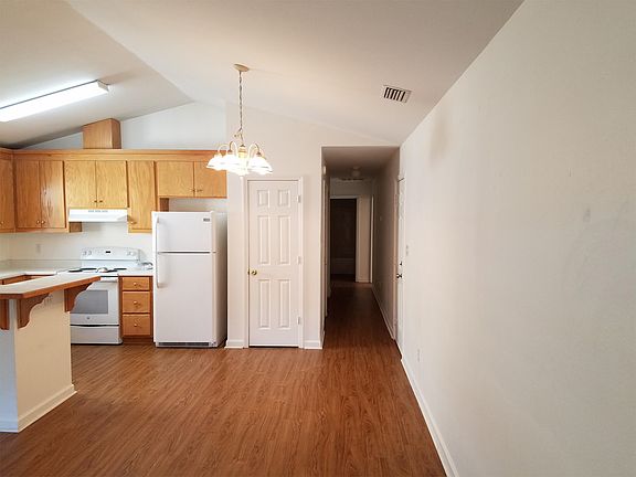 Pantry and Main Hall with Washer / Dryer Hookups