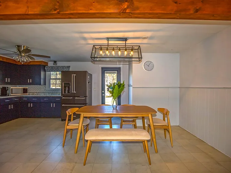 View of Open Kitchen/Dining Area from Living Room