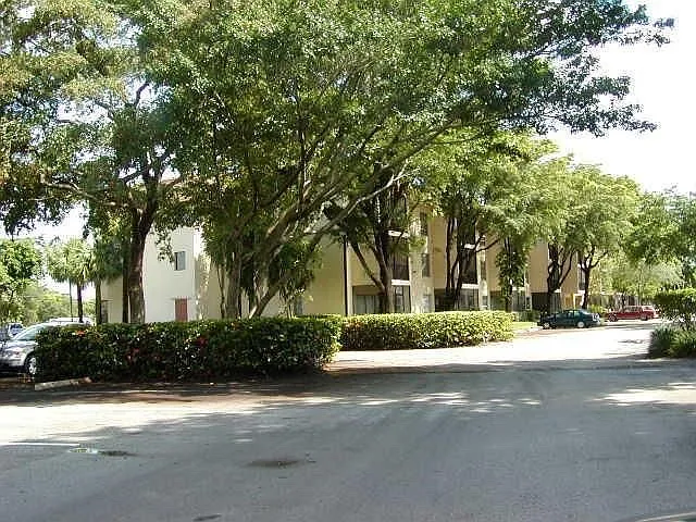 view of outside with large oak trees