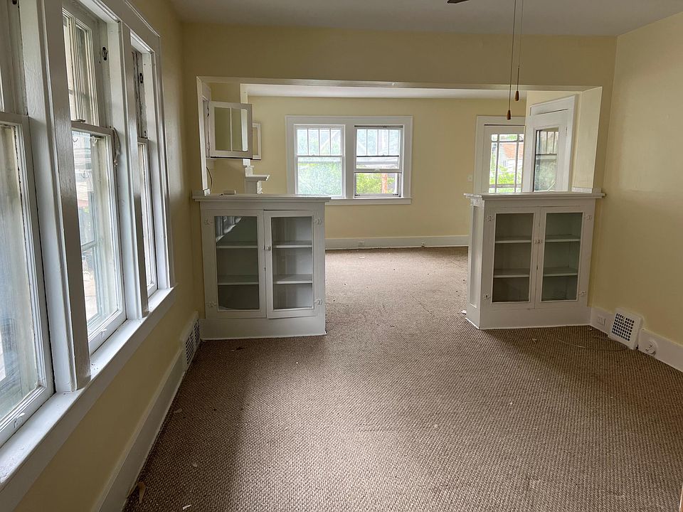 Living Room/Dining Room with brand new carpeting