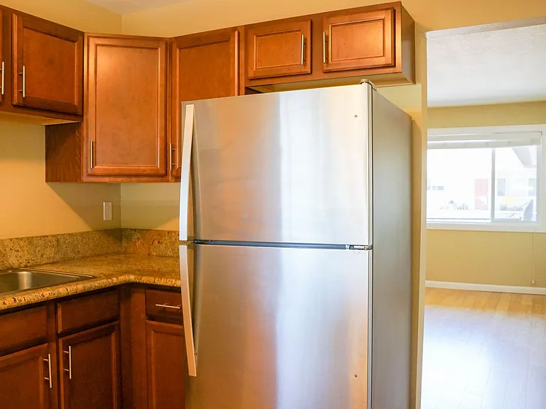 Top-Floor 2-Bedroom with Bamboo Flooring + Off-Street Parking! — Photo 4