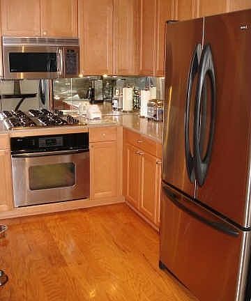 Stainless Steel Appliances, Sile Stone Countertops, Undercounter Lighting, Hardwoods