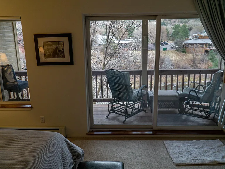 Looking toward lower deck from primary bedroom