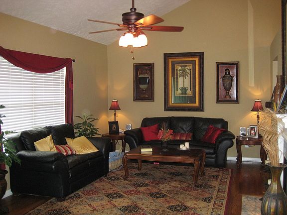 Great room has hardwood flrs, fireplace, vaulted ceiling