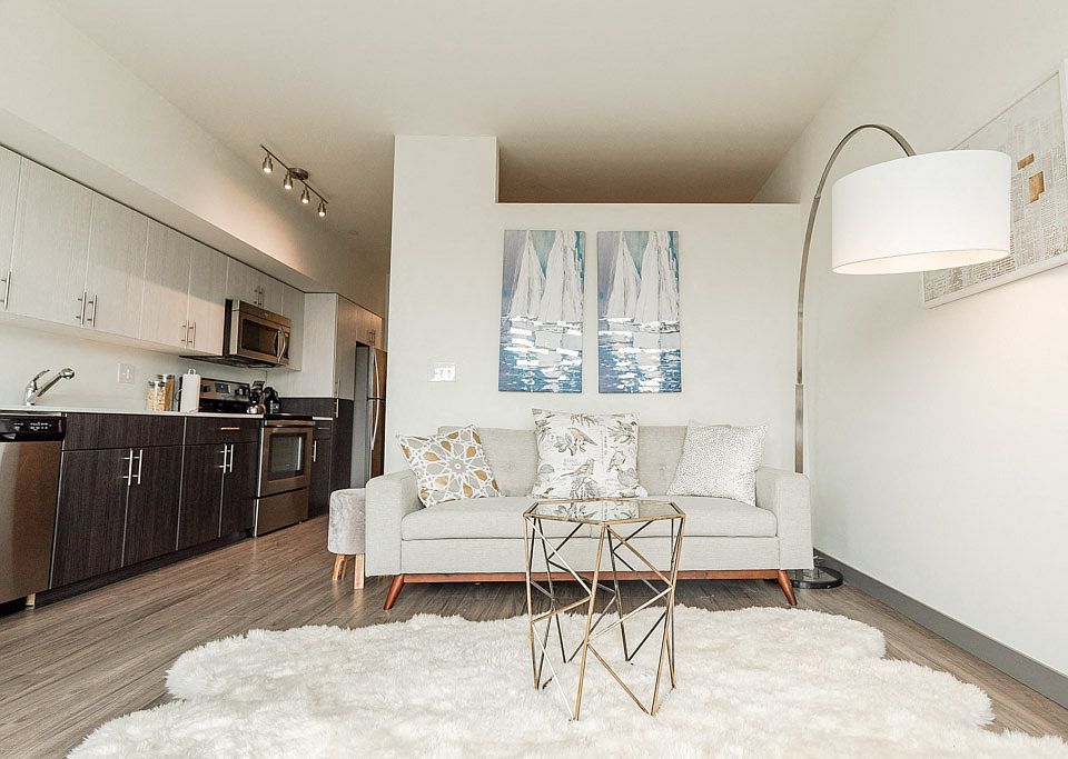 Seattle Apartments - Icon Apartments - Living Room and Kitchen