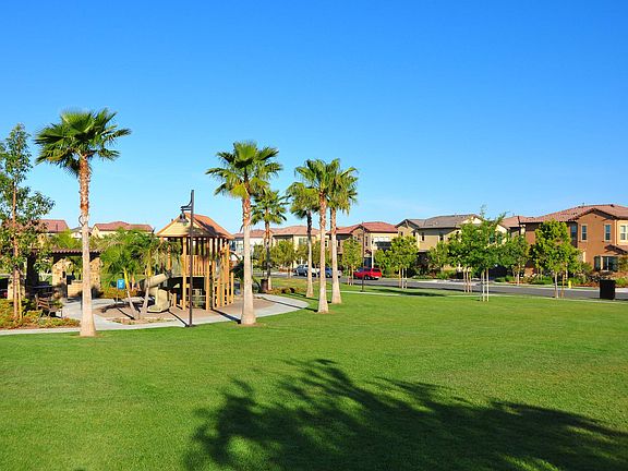 Steps away from a beautiful community park w/playground, BBQ grill, and shaded tables