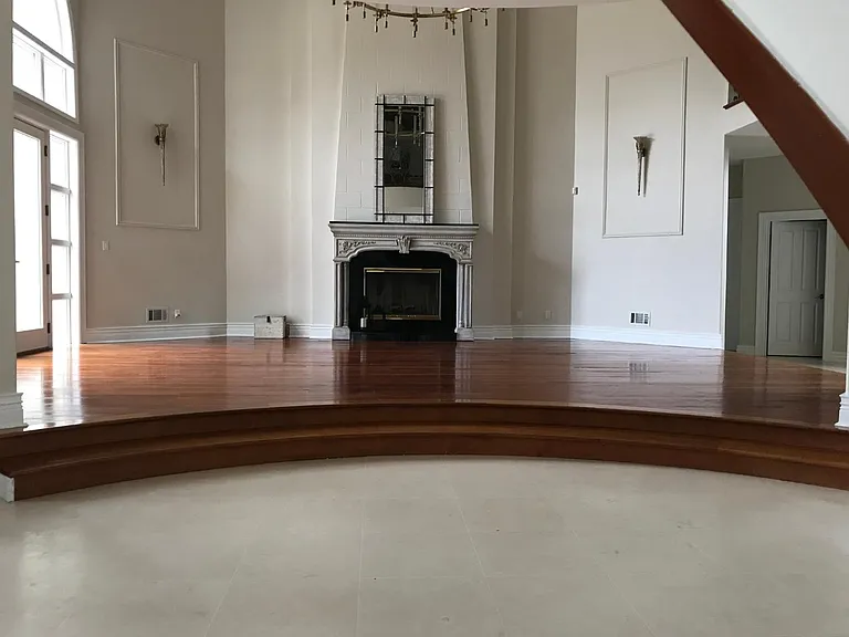 Living room with wood burning fire place