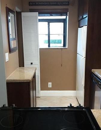 5th image of 701 Gardens Dr APT 103