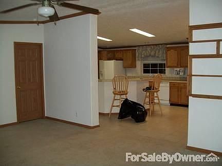 Living room looking into kitchen