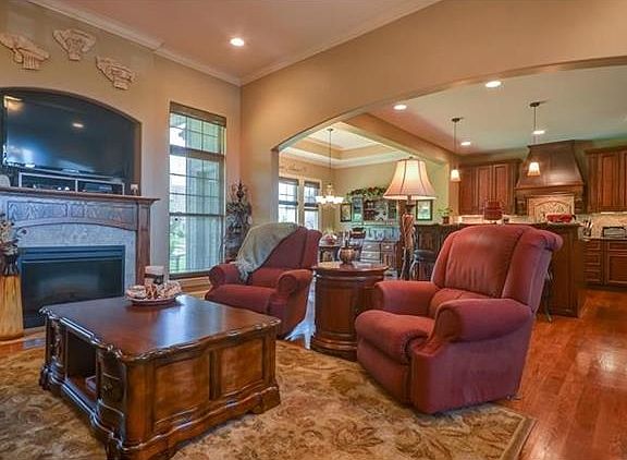 Great Room with view to Kitchen & Dining Areas.