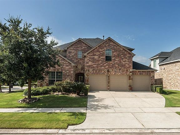 This a a true 3 Car Wide Garage!! And a true 3 car wide driveway!! Plenty of room to park here! Sidewalks throughout for those walks or bike rides to all the community amenities or just to take a leisurely stroll.