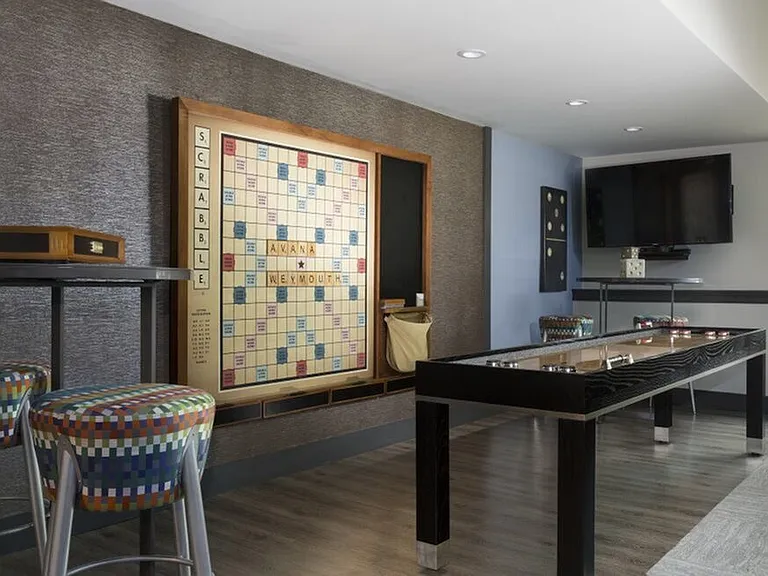 Wall-mounted scrabble in game room