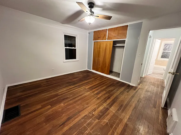 Bedroom 1, larger room with extra large closet
