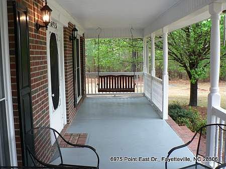 Front porch from the other side.  The swing stays with the house.