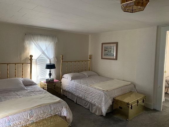 This is a loft style bedroom, no door coming up from the stairs