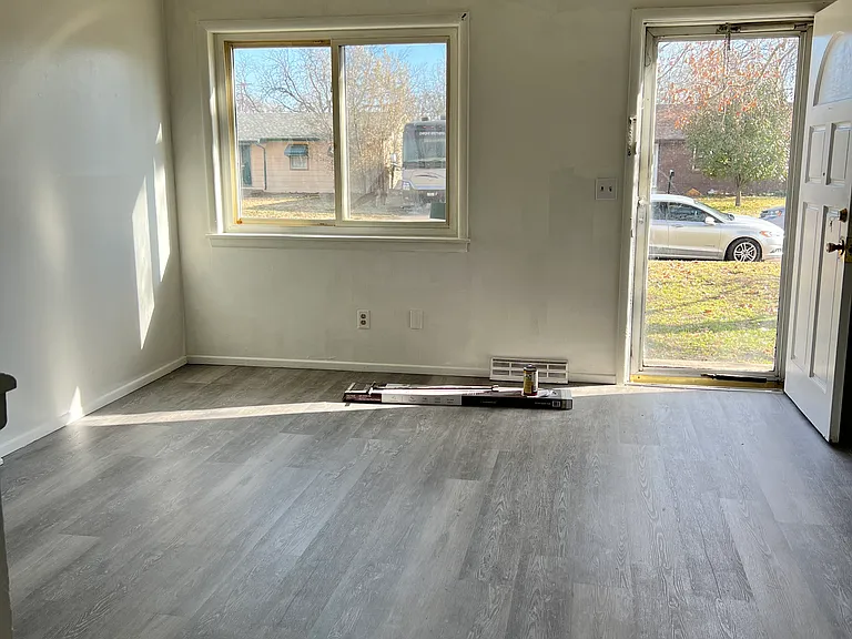 living room different angle, new flooring, new paint