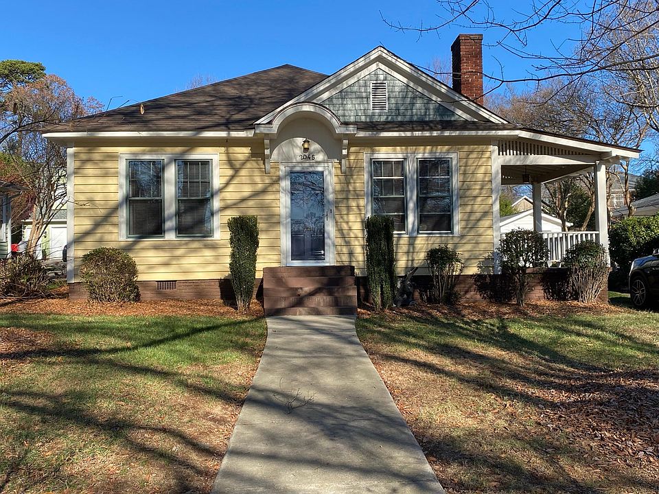 Front, looking to East Fifth Street. Driveway on the right.