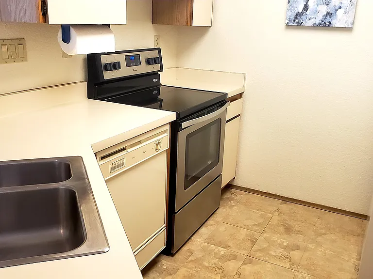Kitchen with glass top stove