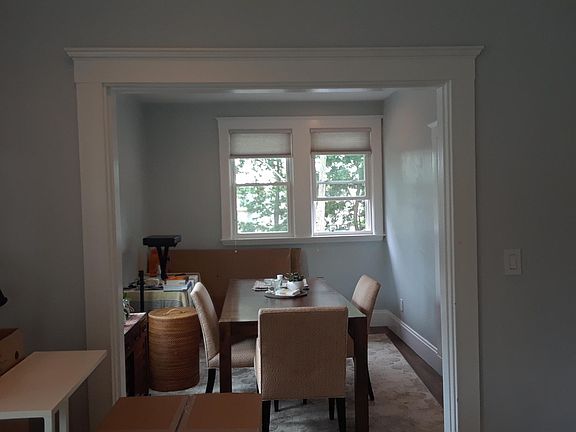 Dining room adjacent to kitchen and living room.
