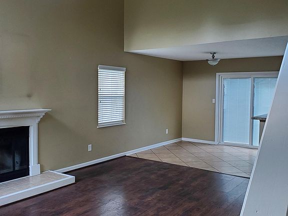 View of living room and dining room from front door