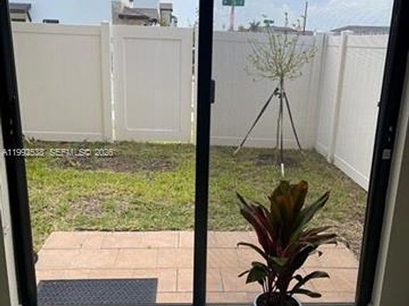 4th image of 11064 W 33rd Way #Townhouse 11064
