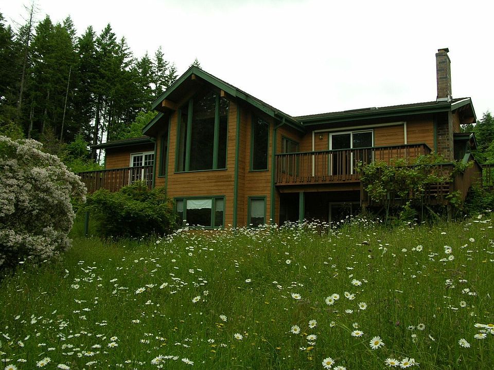 Back of home both levels (new composite deck wraps around 3/4 of home)