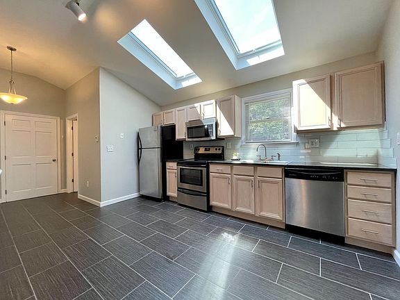 stainless appliances & granite counter