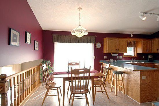 The walkout dining room is open to the kitchen and family room.  